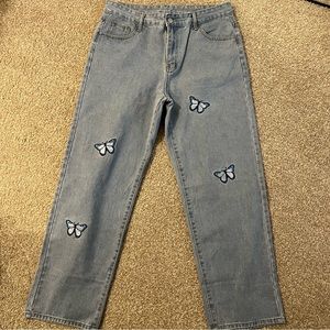 Butterfly embroidered straight-leg jeans. Size 34x30.